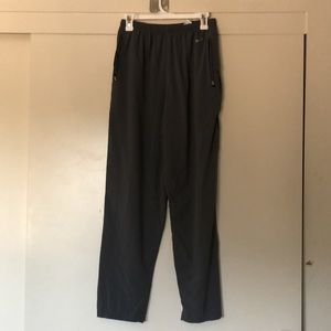 Mens Nike fit dry medium 2 pockets on side both zip. Zip up/down on ankle area